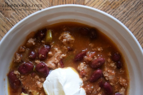 Crockpot Turkey Chili is a healthy slow cooker meal made with lean ground turkey and lots of vegetables. Recipe from aileencooks.com.