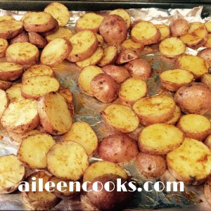 A cookie sheet filled with the roasted red potatoes recipe.