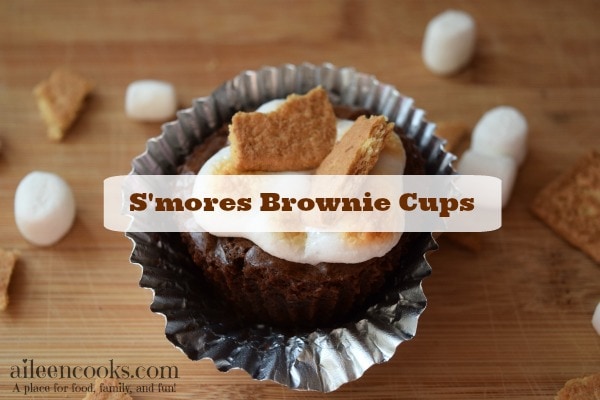 S'mores Brownie Cups made with brownies in a muffin tin and topped with mini marshmallows and graham crackers. Enjoy summer any time!