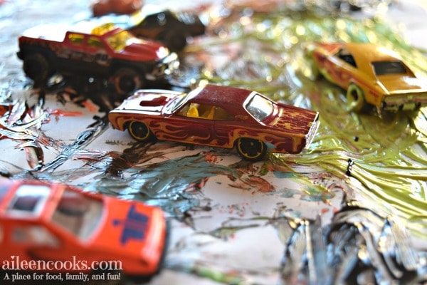 Painting with Cars is the perfect art project for the car lover in your house. #ad