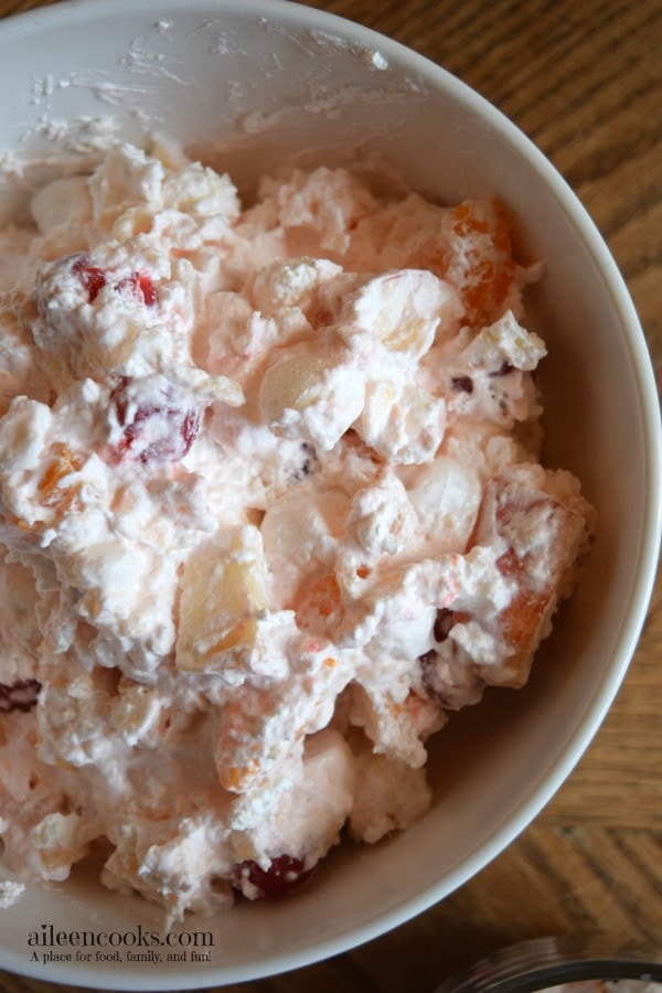 This creamy fruit salad is the perfect side dish for thanksgiving dinner or a backyard barbecue. It's perfectly sweet and could even pass as a healthy dessert. Recipe from aileencooks.com.