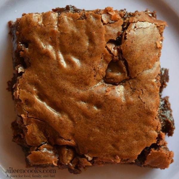 Nutella Brownies are perfectly fudgy, chocolaty, and just a bit chewy. Be prepared to eat the whole pan in one sitting! Recipe from aileencooks.com.