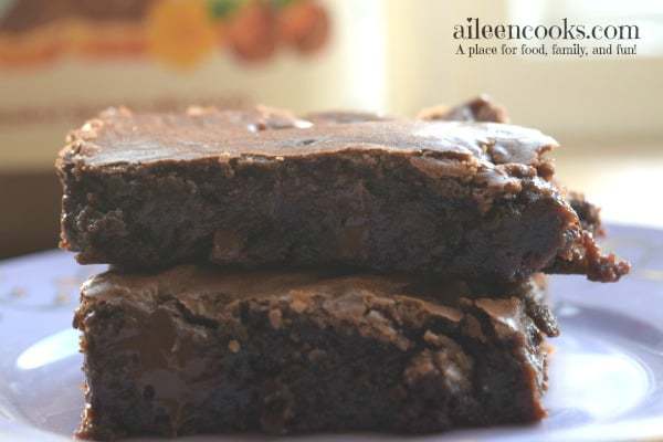 Nutella Brownies are perfectly fudgy, chocolaty, and just a bit chewy. Be prepared to eat the whole pan in one sitting! Recipe from aileencooks.com.