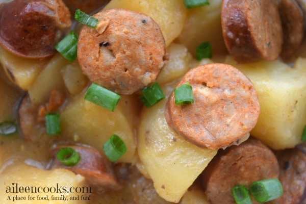 Crockpot Cajun Sausage and Potatoes is the perfect 5 ingredient slow cooker recipe you have been looking for! Recipe from aileencooks.com