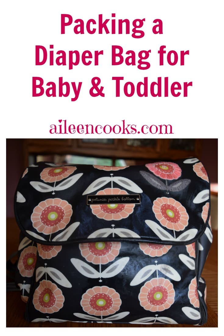 Packing a diaper bag for a baby & toddler I show you what to pack and what not to pack. Article from aileencooks.com #ad