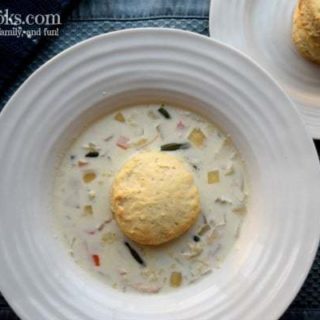 Hearty and deliciuos crockpot chicken pot pie soup is a kid-friendly slow cooker soup - especially when topped with biscuits! Recoipe from aileencooks.com