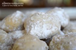 Hazelnut Snowball cookies, often times called mexican wedding cookies or russian tea cakes; are light and buttery and coated with powdered sugar. They are perfect for a cookie exchange or christmas cookie. Recipe form aileencooks.com
