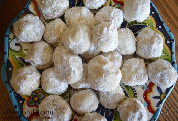 Hazelnut Snowball cookies, often times called mexican wedding cookies or russian tea cakes; are light and buttery and coated with powdered sugar. They are perfect for a cookie exchange or christmas cookie. Recipe form aileencooks.com
