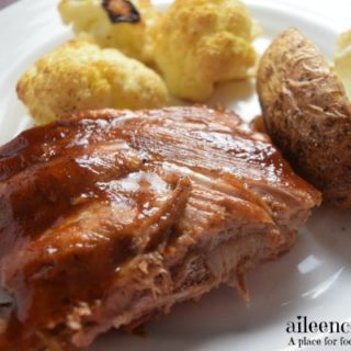 Make tender and flavorful instant pot apple barbeque ribs in under an hour with this 5 ingredient recipe. Pressure Cooker Apple BBQ Ribs recipe from aileencooks.com.