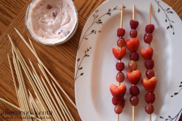 Make this healthy valentine's day snack for kids. Fruit Kabobs with Strawberry Dip. This is a yummy and healthy snack that is perfect for a cooking with kids activity. Recipe from aileencooks.com.