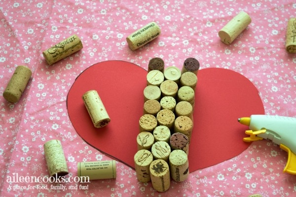 DIY Heart Shaped Wine Cork Trivet. This is the perfect wine cork craft for Valentine's Day. Project from aileencooks.com.
