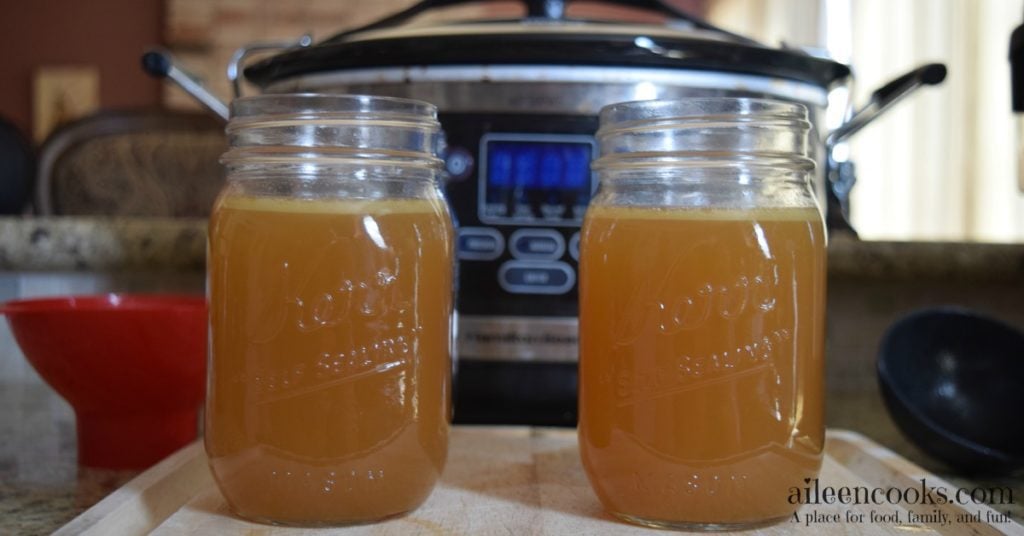 A frugal and healthy recipe for crockpot chicken stock cooked overnight while you sleep. Slow Cooker Chicken Broth recipe from aileencooks.com.