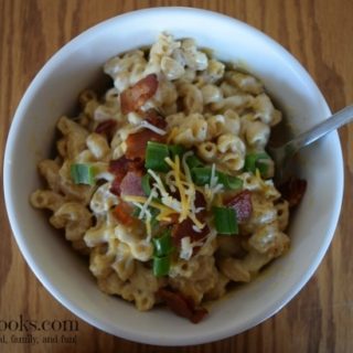 Instant Pot Loaded Macaroni and Cheese. A kid-friendly pressure cooker 30 minute meal. Loaded with bacon, cheese, and green onions. I dare you not to have seconds! recipe from aileencooks.com