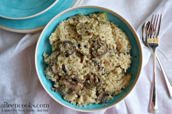 Enjoy a creamy and delicious mushroom and parmesan risotto without standing over the stove for 30 minutes. This instant pot risotto cooks in just 7 minutes - without any babysitting! This recipe is perfect for Meatless Monday, too! Recipe from California Lifestyle Blogger Aileen Clark. Healthy recipes, rice recipes, instant pot recipes, easy dinners, 30 minute meals. 