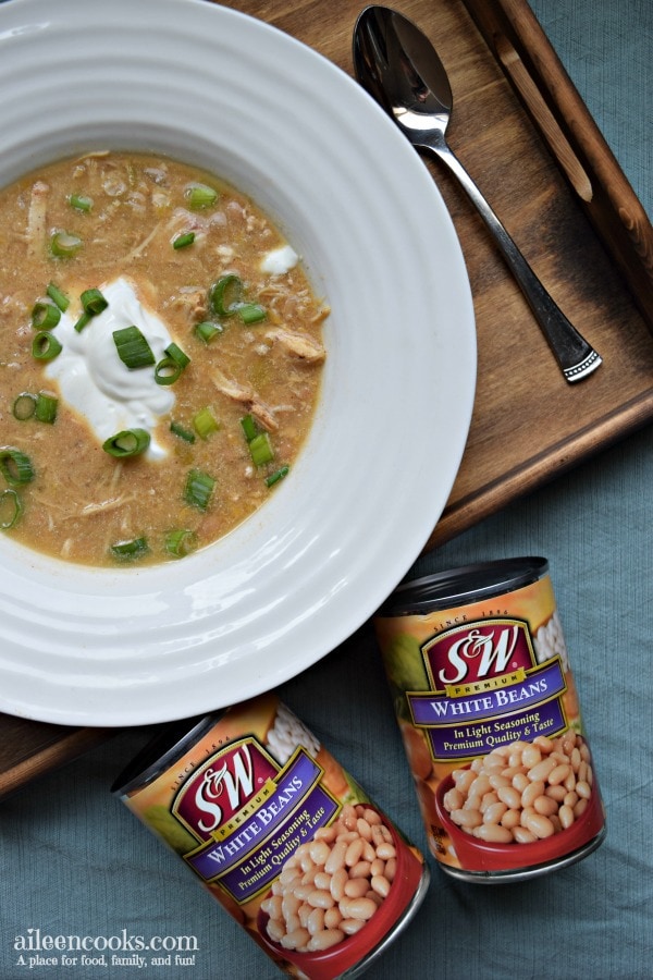 Instant Pot White Chicken Chili cooks in just 30 minutes in the instant pot electric pressure cooker. Tastes great and feeds a crowd!