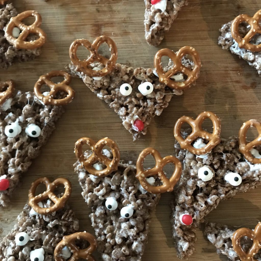 Make these fun and delicious rice krispie treat reindeer using cocoa krispies. This recipe is from California lifestyle blogger Aileen Clark.