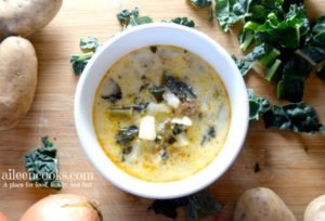 Make this delicious and hearty instant pot zuppa toscana soup at home! This recipe makes a large batch that tastes wonderful the next day. It's filled with hot Italian sausage, kale, hearty potatoes, garlic, and onion.