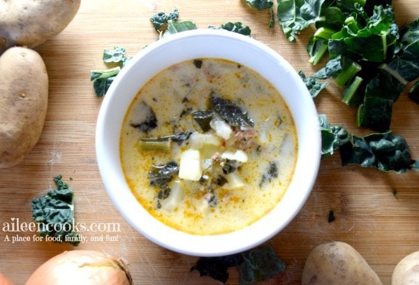 Make this delicious and hearty instant pot zuppa toscana soup at home! This recipe makes a large batch that tastes wonderful the next day. It's filled with hot Italian sausage, kale, hearty potatoes, garlic, and onion. 