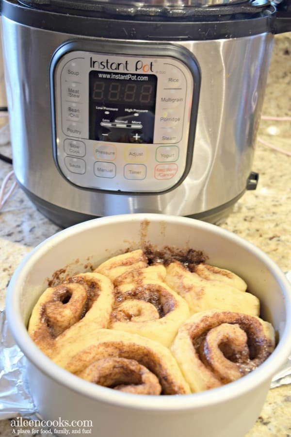 Make these ooey gooey delicious instant pot cinnamon rolls from scratch. No rise time needed! One of our favorite instant pot desserts / instant pot breakfast recipes!