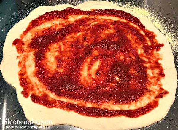 Our quick and easy recipe for no-cook homemade pizza sauce! We make this recipe each week for our pizza and a movie family night!