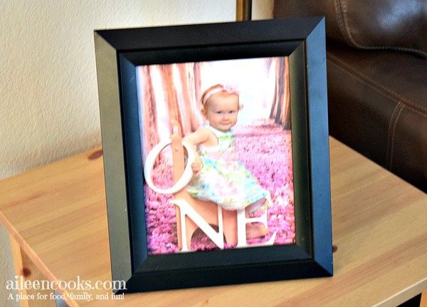 Learn how to spray paint black picture frames white with this easy to follow tutorial!