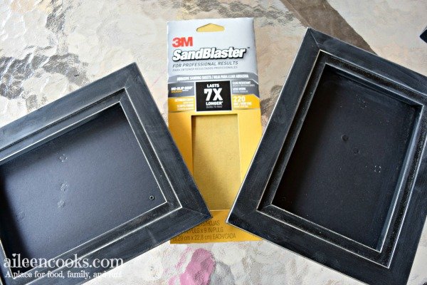 Learn how to spray paint black picture frames white with this easy to follow tutorial!