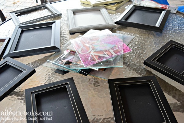 Learn how to spray paint black picture frames white with this easy to follow tutorial!