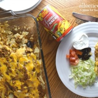 Make this crowd-pleasing nacho cheese taco casserole. It's packed full of taco flavor and topped with delicious nacho cheese!