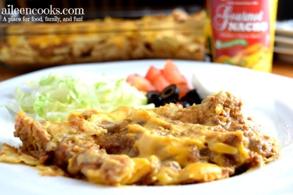Make this crowd-pleasing nacho cheese taco casserole. It's packed full of taco flavor and topped with delicious nacho cheese!