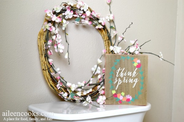 think spring sign and spring wreath