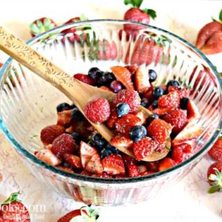 fruit salad with wooden spoon