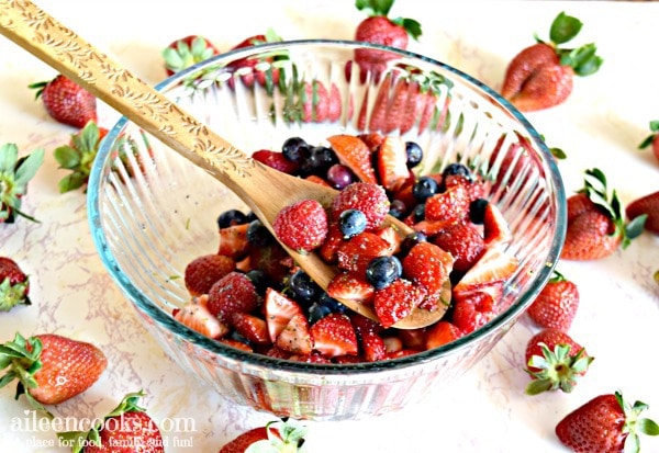 fruit salad with wooden spoon