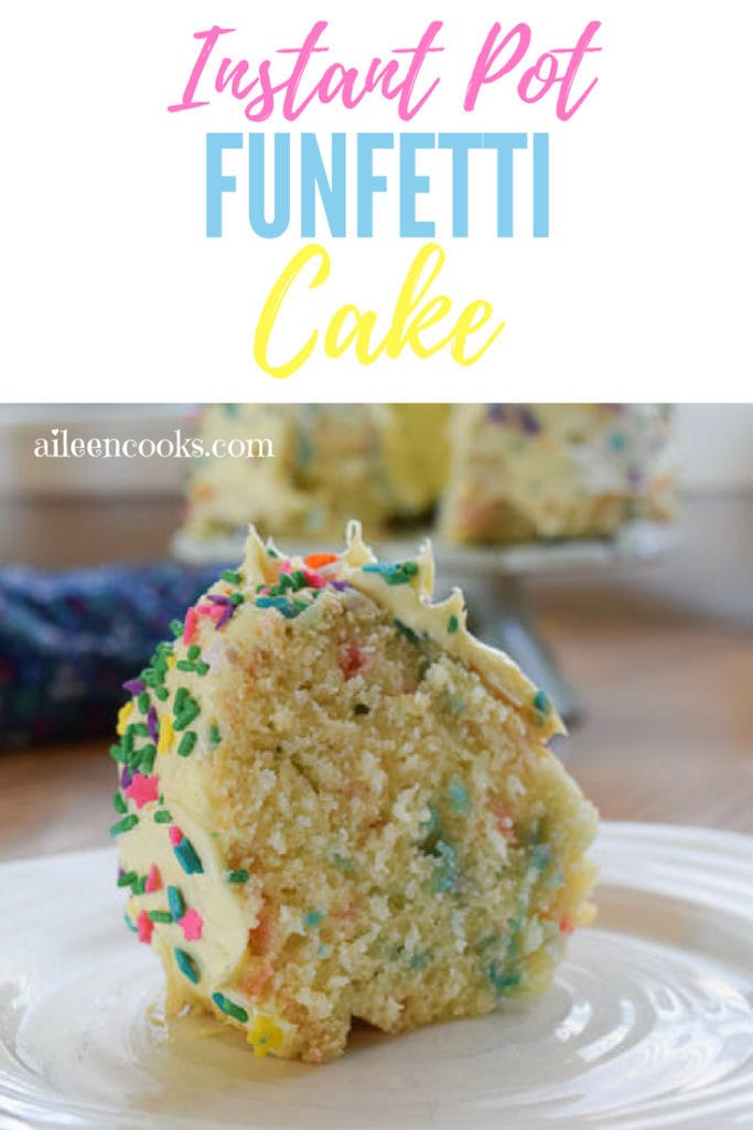 A slice of instant pot Funfetti Cake topped with confetti sprinkles.