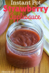 glass mason jar of instant pot strawberry applesauce