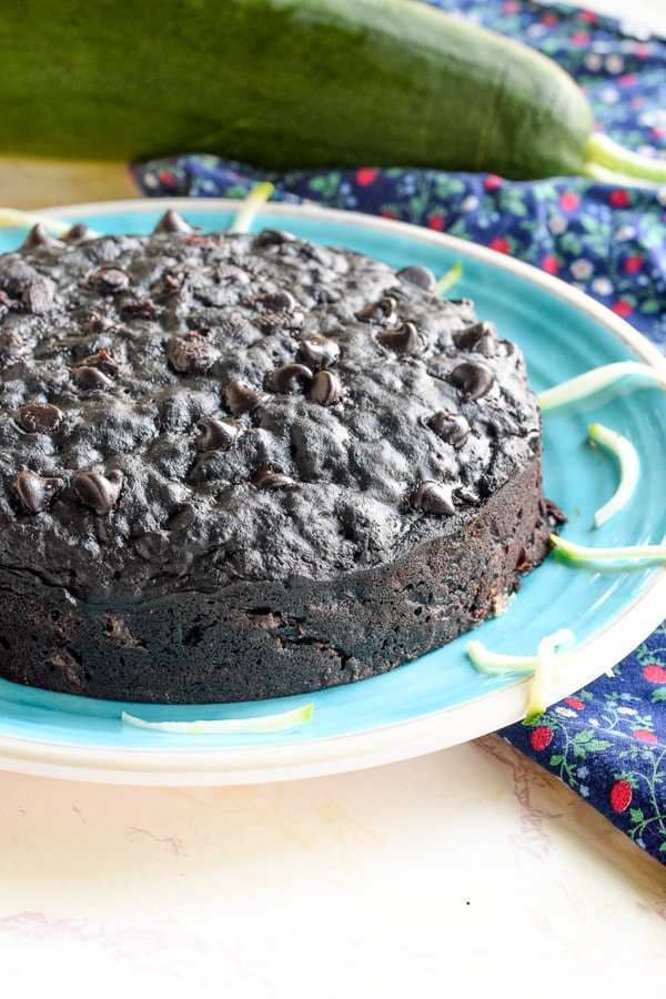 instant pot double chocolate zucchini bread on a blue plate