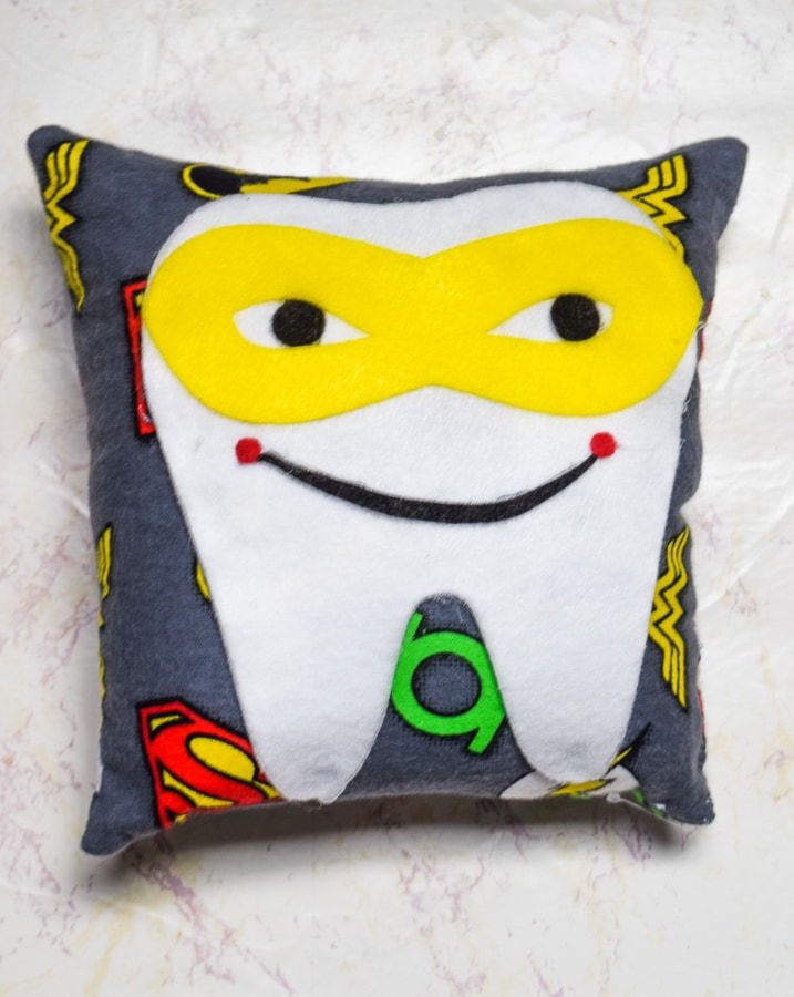 Super Hero DIY Tooth Fairy Pillow with a yellow mask.