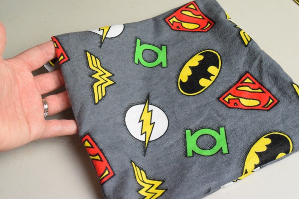 Superhero fabric sewn together and ready to attach the fabric tooth.