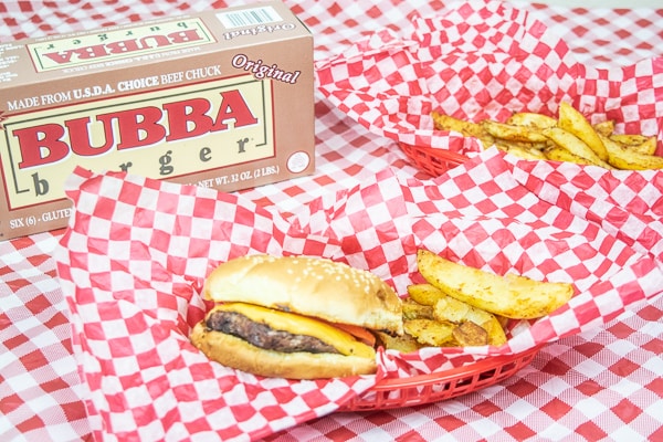BUBBA burgers and zesty fries on a red checkered tablecloth.
