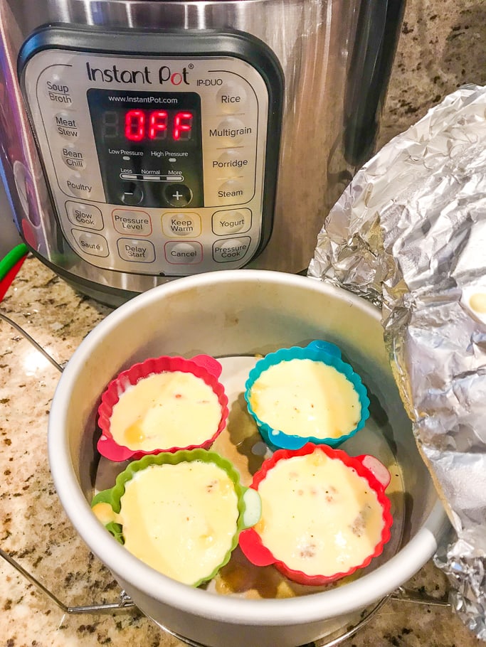 Cooked egg bites in front of an instant pot.
