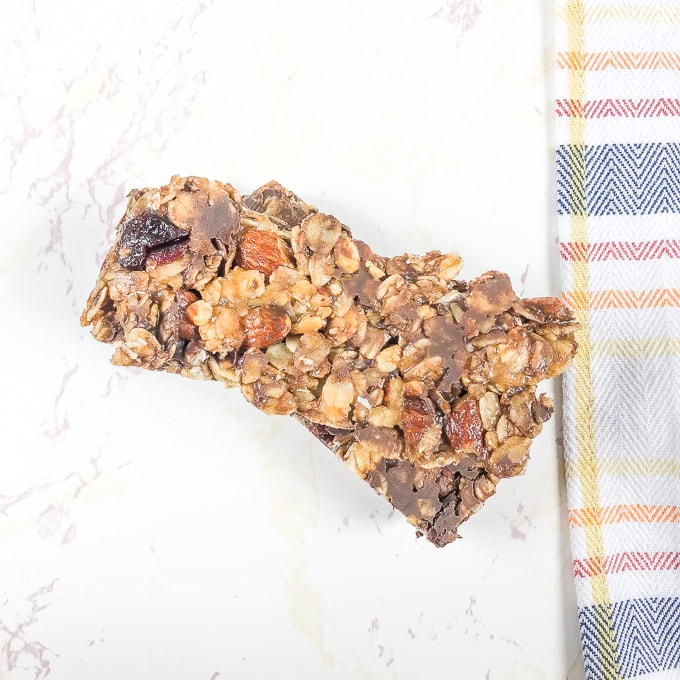 Instant pot granola bars on a white counter next to a plaid towel.