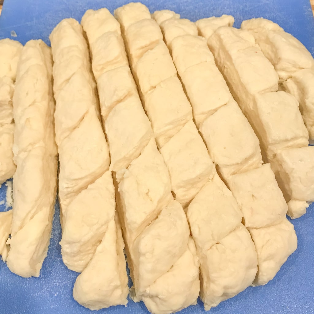 Biscuit dough cut into 1-inch chunks.