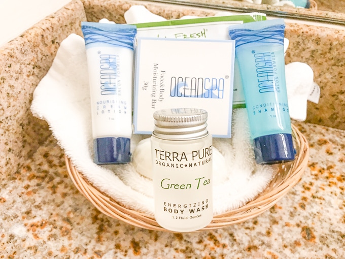 A basket of travel-sized beauty products. 