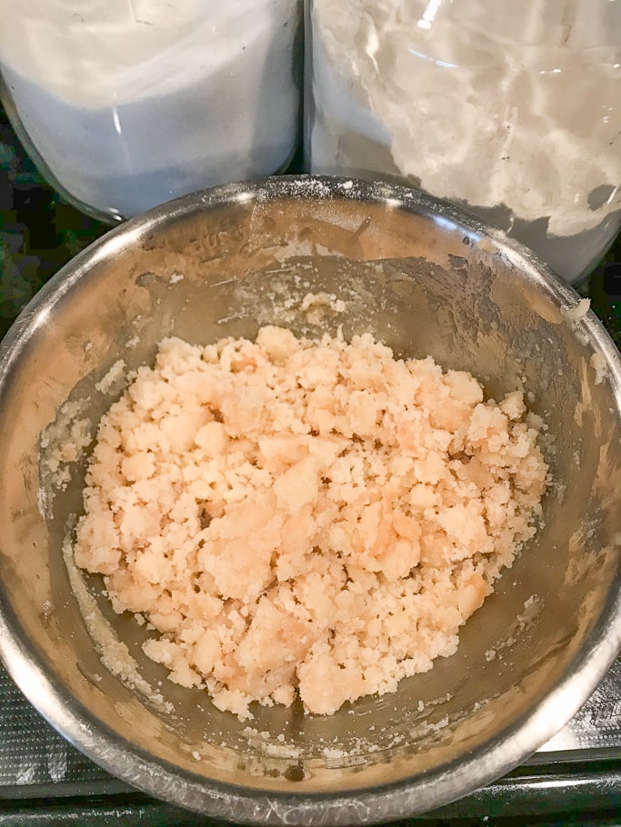 Cobbler batter in a metal bowl.