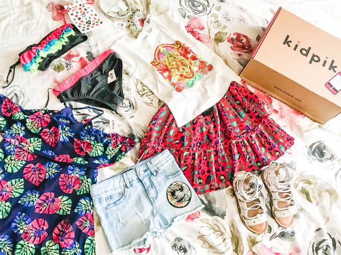 A flat lay of the Kidpik summer box outfits.
