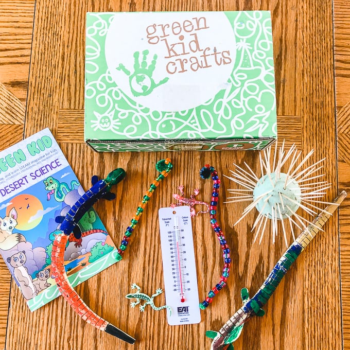 Flat lay of the green kids box review including all of the completed project.