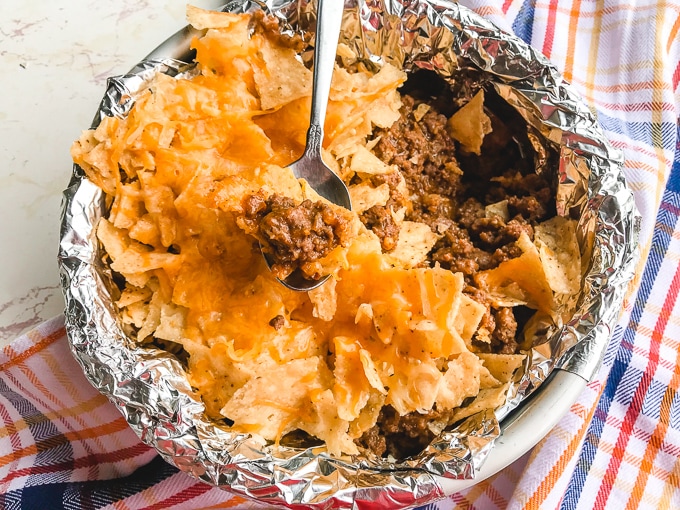 A foil-lined pan with instant pot taco casserole inside.