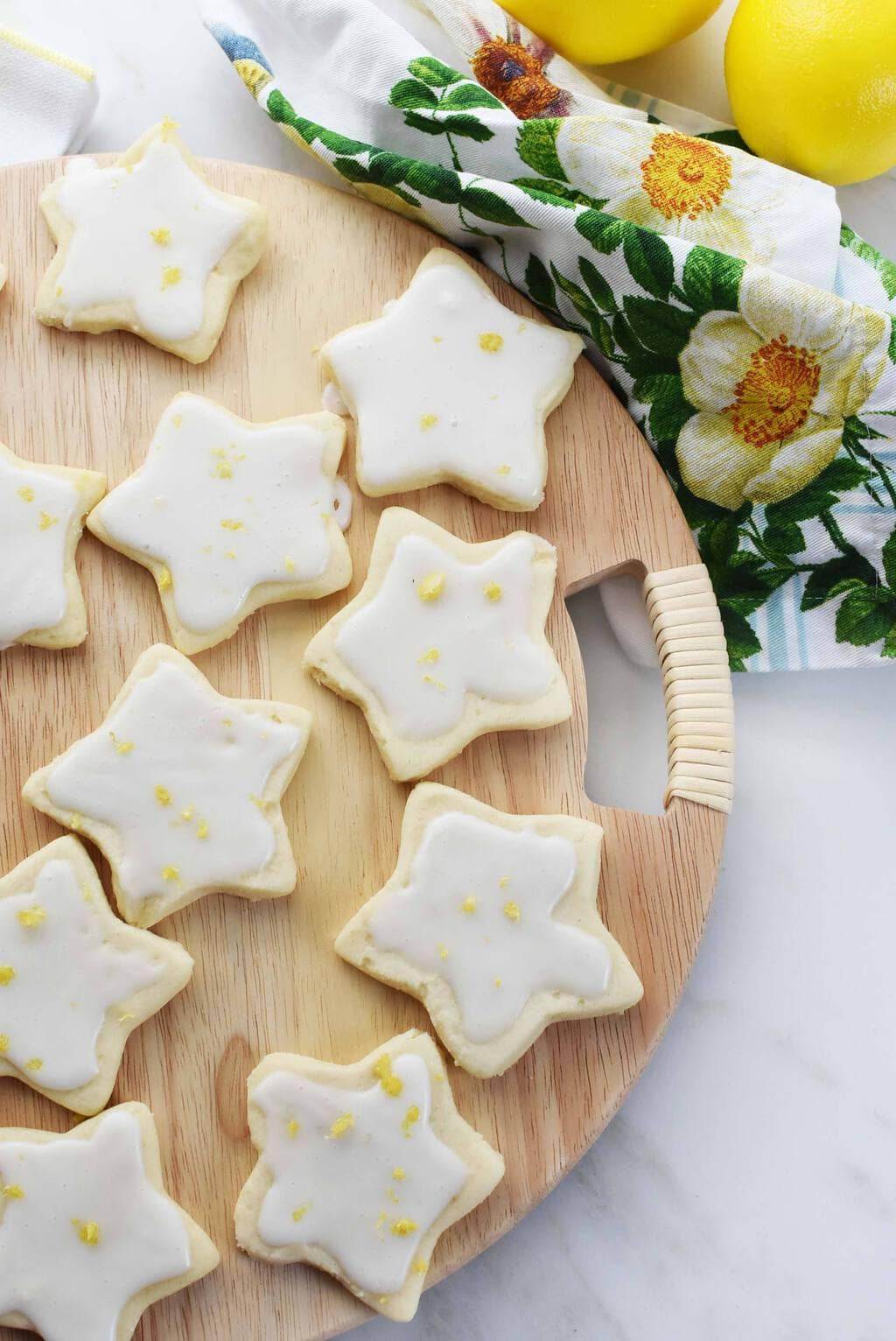 Star shaped shortbread cookies with lemon icing.