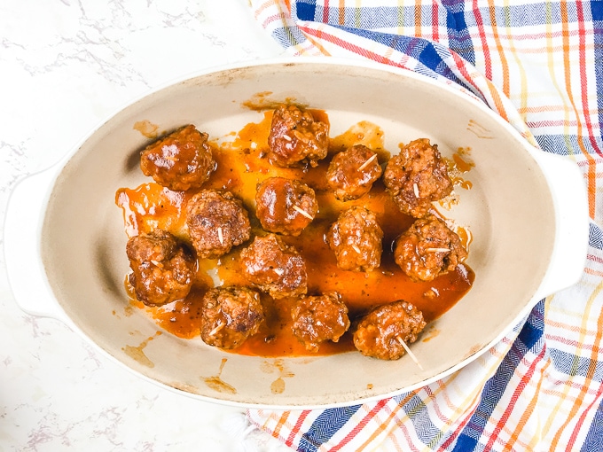 Instant pot meatballs in an oval dish.