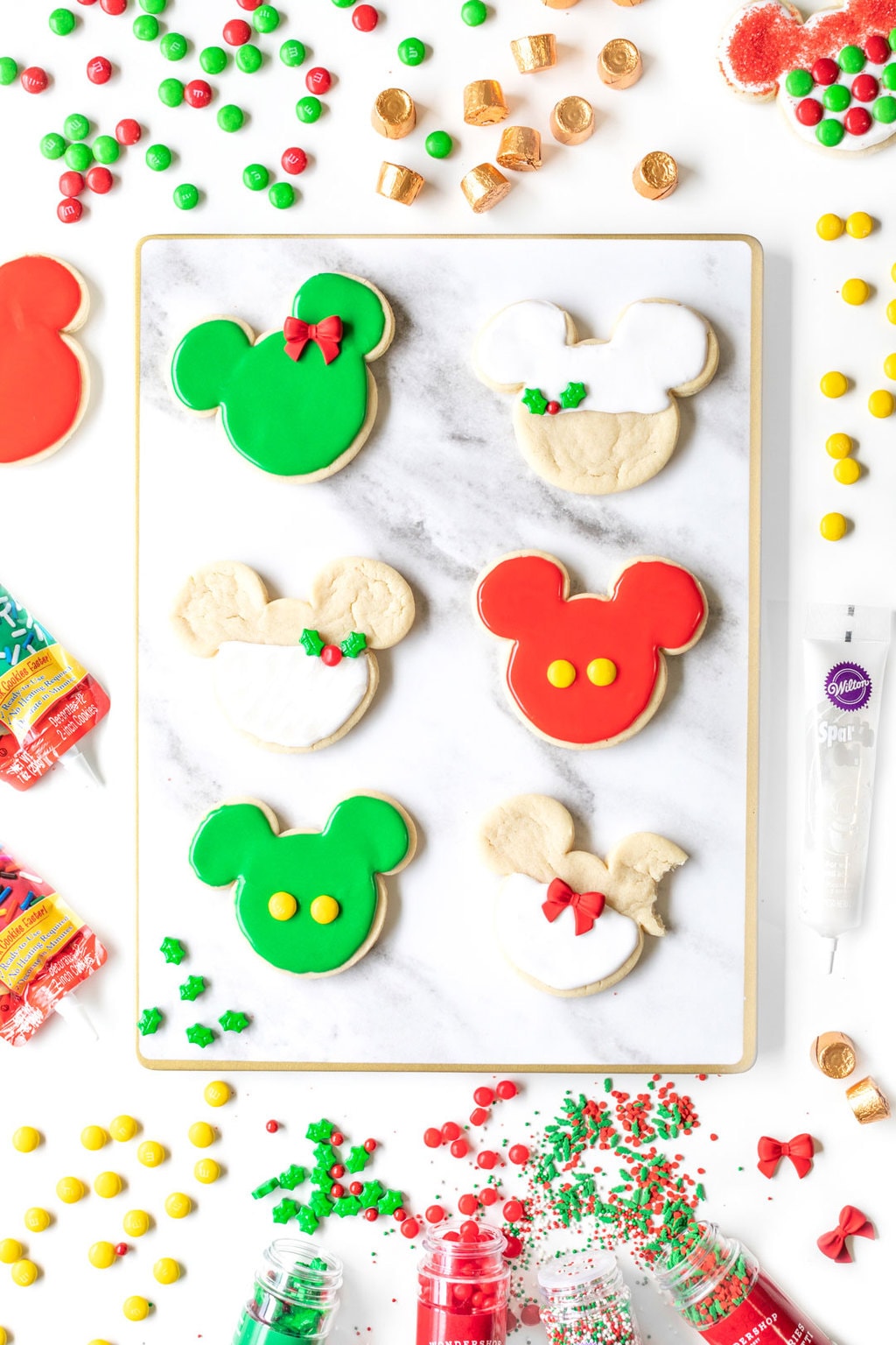 Christmas colored Mickey Mouse cookies.
