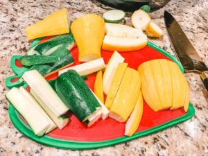 Zucchini and squash cut into wedges.